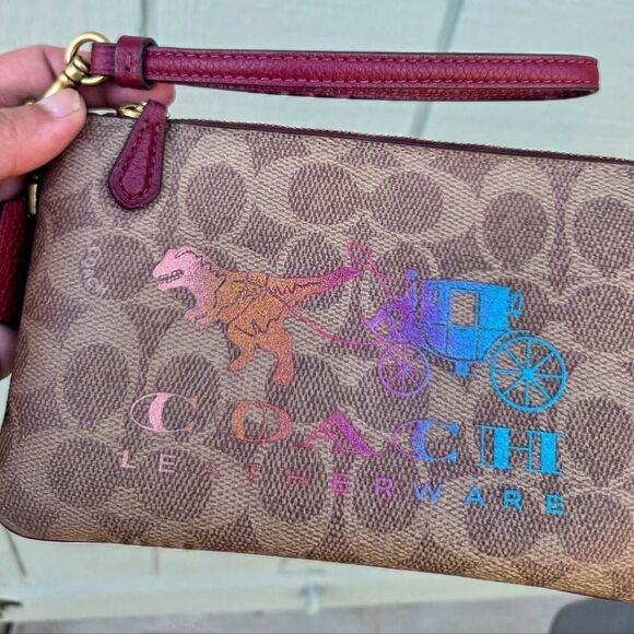 Coach Signature Canvas w/ Rexy and Carriage Motif Small Zip Wristlet. #88771 - Picture 2 of 7